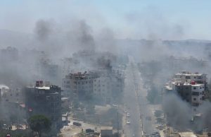 Homes still burning after mass pillaging and 30,000 trapped in besieged city – as Syria’s fragile ceasefire holds | World News