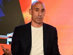 Former Spanish football boss who kissed player without consent pelted with eggs | World News