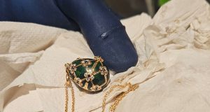 Stolen Fabergé pendant passed to police – quite literally | Offbeat News