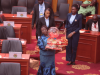 Tourism minister promotes ‘made-in-Ghana’ chocolate on the floor of Parliament