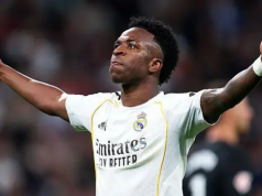 Vinicius scores twice as Real beat Atletico in thriller