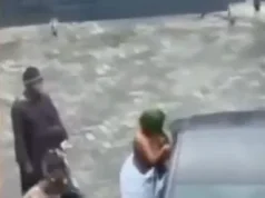 Husband nabs wife in the hotel room with another man