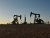 Oil slips again as US, Iran sign peace deal