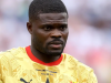 Spence appears not to shake hands with Partey