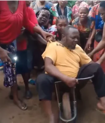 Female community members discipline husband who assaults his wife