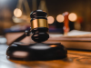 Alleged robber mistakenly shot by colleague hauled to court