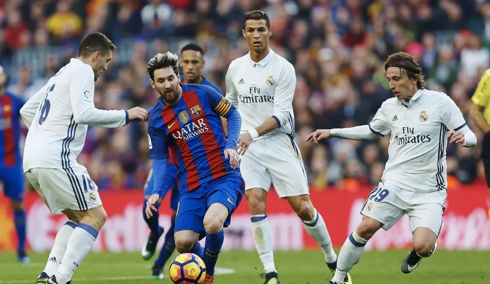 Messi-v-Ronaldo-scaled-1.jpg