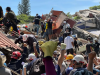 Brother of man trapped under rubble in Colombian quake clings on to hope