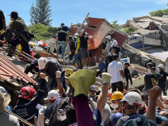 Brother of man trapped under rubble in Colombian quake clings on to hope