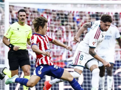 Atletico beat 10-man Real in feisty Madrid derby