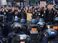 Scores detained in Paris as protesters clash with police during nationwide demonstrations in France