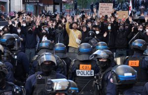 Scores detained in Paris as protesters clash with police during nationwide demonstrations in France