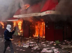 Violent clashes, looting and buildings ablaze in France as over 1,000 arrested after protests