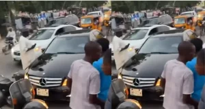 Husband catches wife with another man inside a Benz
