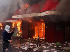 Violent clashes, looting and buildings ablaze in France as more than 1,200 arrested after protests