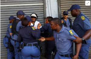 South African police investigate killing of foreign national by crowd