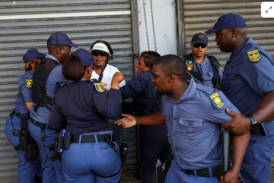 South African police investigate killing of foreign national by crowd